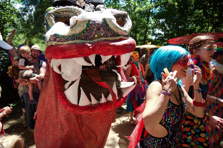 Peachi the Dragon comes out of its lair for the path parade.