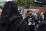 Patriot Prayer leader Joey Gibson argues with members of the Satanic Portland Antifascists during a Patriot Prayer march on September 15, 2019 in Portland's Pioneer Square.