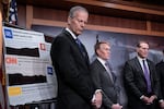 From left, Senate Majority Leader John Thune, R-S.D., Sen. James Lankford, R-Okla., and Sen. Ted Budd, R-N.C., talk to reporters about the Laken Riley Act, a bill to detain unauthorized immigrants who have been accused of certain crimes, at the Capitol in Washington, D.C., on Jan. 9.