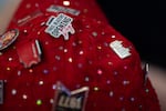 Pins new and old adorn Bonnie Gardner’s hat. She has been collecting the pins since 1972.