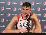 Portland Trail Blazers center Donovan Clingan answers questions at the team's media day Sept. 30, 2024. Clingan was the no. 7 pick in the NBA draft.