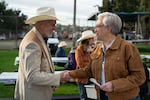 Oregon Gov. Tina Kotek shakes hands with Dan Glenn of Pendleton at the VFW Outdoor Cowboy Breakfast on Friday, Sept. 18, 2026.