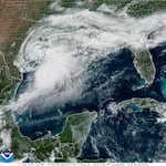 Tropical Storm Arthur, seen here in a satellite image from Wednesday morning, is the first named storm of the Atlantic season, bringing the threat of dangerous floods along the northern coast of the Gulf of Mexico. The National Hurricane Center predicts the system will not strengthen much before making landfall.