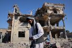 Residents walk through the rubble after what Taliban officials said were Pakistani airstrikes a day earlier that killed civilians, including children, in the village of Mandokhail, Chamkani district, Paktia province, Afghanistan, Monday, June 29, 2026.
