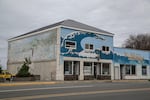 A wave mural covers the facade of a building in downtown Gold Beach. Recently released maps from the Oregon Department of Geology and Mineral Industries show extensive tsunami inundation throughout Gold Beach in the scenario of the 9.0 megaquake due on the Northwest coast.