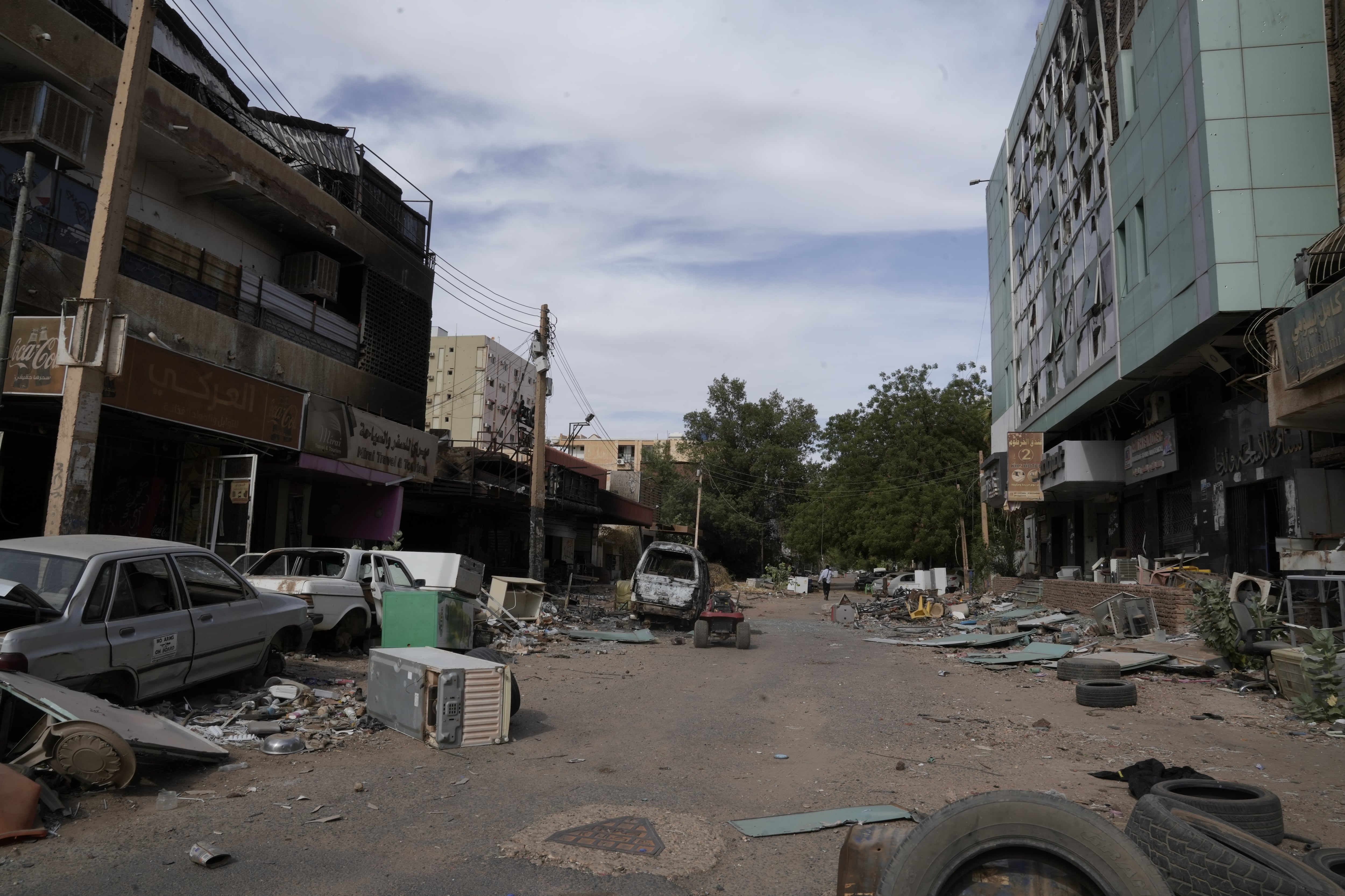 A damaged street in the heart of Khartoum — a bustling metropolis of 6 million before the war began in April 2023.