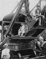 FILE - U.S. President Theodore Roosevelt tests a steam shovel at the Culebra Cut during construction of the Panama Canal, a project he championed, November 1906. Roosevelt's visit to Panama made him the first sitting U.S. president to travel abroad.