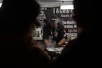 A taquero makes a quesadilla at the Día de Muertos celebration in Bend, Ore., on Nov. 7, 2025.
