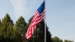 A flag was set to half staff at the Willamette National Cemetery in Happy Valley, Oregon.