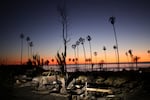 The devastation of the Palisades Fire is seen at sunset in the Pacific Palisades neighborhood of Los Angeles, Tuesday, Jan. 14, 2025.