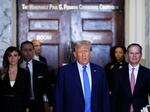 Former President Donald Trump speaks to the media as he arrives for his civil fraud trial at New York State Supreme Court on Nov. 6, 2023 in New York City.