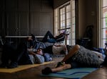 People seek shelter from the heat at a church in Phoenix in July 2023. Data about heat-related fatalities has helped spur emergency managers across the U.S. to open cooling centers on hot days. More detailed data about such deaths could help officials decide where to open such centers and how to ensure vulnerable people can access them.