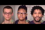 From left Damion Feller, Adebisi Ashley Okuneye and Hollis McClure were arrested for disorderly conduct during a protest in downtown Portland, March 29, 2017. They were booked, released and given traffic citations for "improper position on highway."