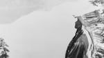 A Klamath Indian chief in a feather headdress stands on a mountain overlooking Crater Lake in 1923, long considered a sacred spot by local tribes. In 1902, the lake became a national park thanks to William Gladstone Steel, who for 17 years petitioned Congress to protect the natural wonder.