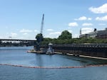 The Department of Environmental Quality begins cleanup of contaminated soil at the former Portland Gas Manufacturing site. The agency is using a moon pool to prevent the release of contaminants to the river. 