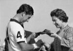 July 26, 1981: Queen Elizabeth II presents her son Prince Charles with a trophy after the Prince's team, England II, beat Spain 10-5 for the Silver Jubilee Polo Cup at the Guards Polo Club in Windsor, England.