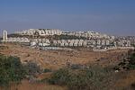 The Israeli settlement of Har Homa, backdropped by the Israeli-occupied Palestinian West Bank city of Bethlehem (right), is seen in the Israeli-annexed East Jerusalem on Aug. 14.