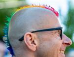 Charlie Dickerson watches the Portland Pride parade move along its route.
