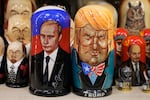 Traditional Russian wooden dolls called Matryoshka depicting Russian President Vladimir Putin, front left, and US President-elect Donald Trump, front right, are displayed for sale at a souvenir shop in St. Petersburg, Russia, Monday, Jan. 20, 2025.