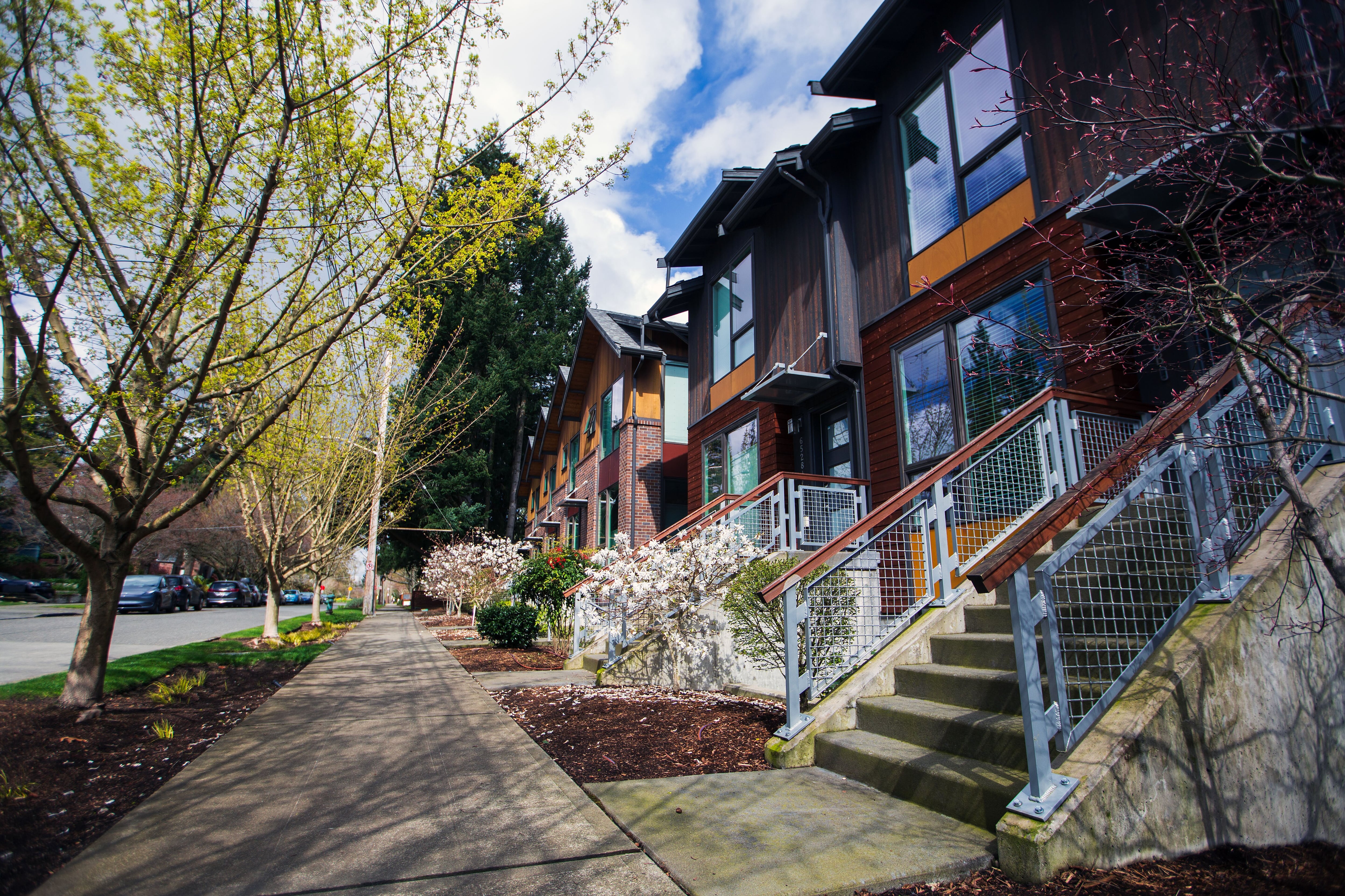 The Bryant Heights development is a modern mix of apartments, town houses, single-family homes and retail. Architects Ray and Mary Johnston worked with the developer to place 86 housing units where there were initially four.