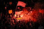 People protest against Prime Minister Benjamin Netanyahu's government and call for the release of hostages held in the Gaza Strip by the Hamas militant group, in Tel Aviv, Israel, Saturday, Oct. 19, 2024.