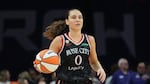FILE - Portland Fire guard Carla Leite dribbles the ball against the Phoenix Mercury during the first half of a WNBA basketball game, Sunday, Aug. 16, 2026, in Phoenix.