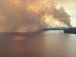 Smoke from the Cedar Creek fire dances across the surface of Waldo Lake in this photo from early September.