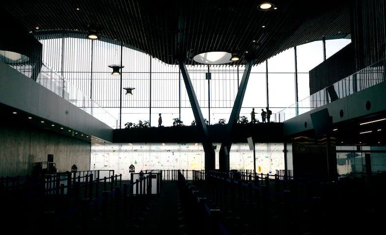 Portland artist Yoonhee Choi created two large glass walls, bottom, for each of the queuing areas near the TSA checkpoints at the Portland International Airport. The walls are 56 feet long by 11 feet high.