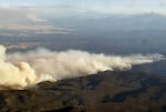 Heavy smoke rolls off of a wildfire burning in Central Oregon, July 27, 2026. As of Tuesday, large fires covered more than 1.1 million acres, according to the Oregon Department of Forestry.