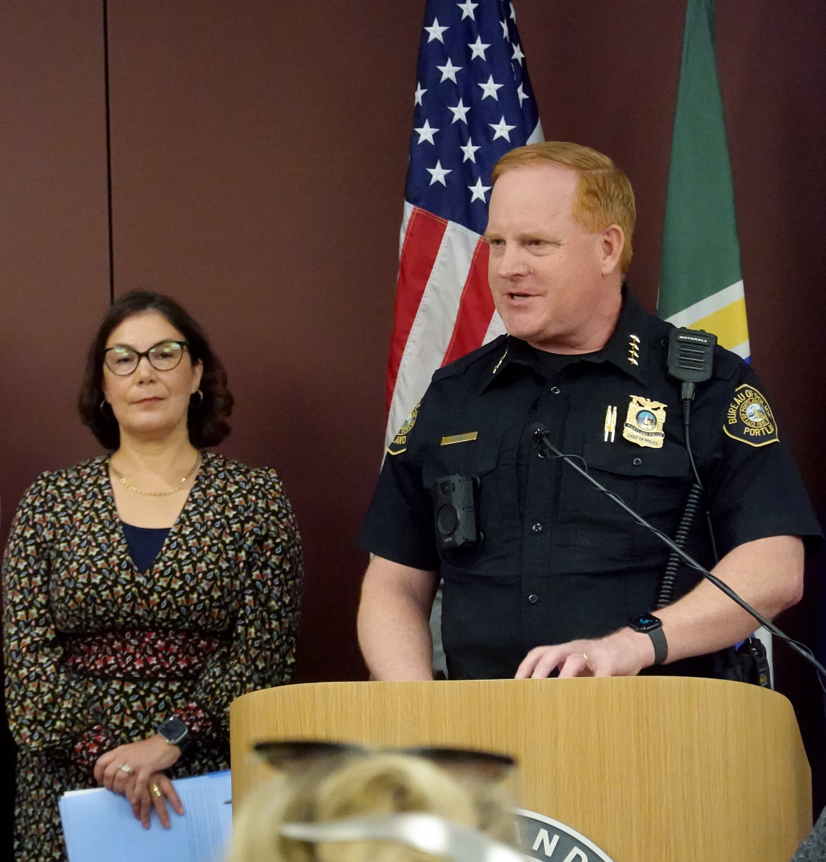 Portland Police Bureau Chief Bob Day, right, speaks at a press conference on June 13, 2025, ahead of large protests planned in the downtown area. Day has asked for peaceful protesting from demonstrators.