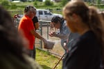 While volunteers made introductions and shared their personal connections to Chemawa and other Native American boarding schools, one elder held a terracotta planter filled with burning sage and smudged everyone in attendance.