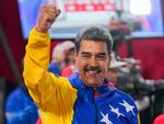 President Nicolas Maduro addresses supporters after electoral authorities declared him the winner of the presidential election in Caracas, Venezuela, Monday, July 29, 2024.