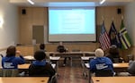 FILE: Portland Street Response former program manager Robyn Burek lectures a new batch of program trainees in 2022. Burek left the position in early July 2023.