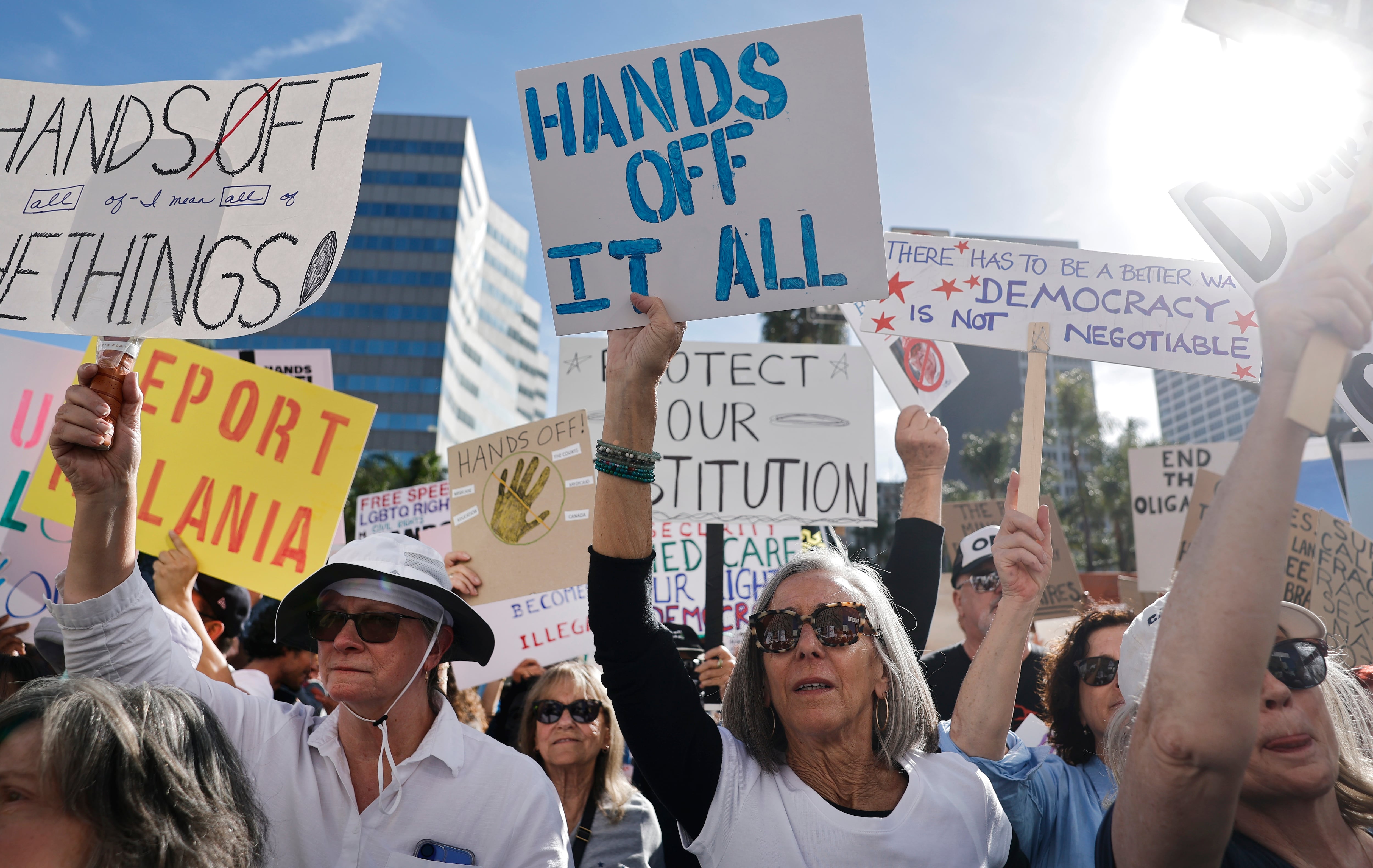 Protesters march during a 'Hands Off!' protest against the Trump administration on April 5 in Los Angeles.
