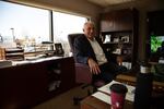 Jon Creedon, president of Vancouver Auto Group, sits in his office on March 20. Creedon said auto sales have dropped, but he expects they will rebound.