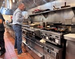 Mike Christman,  a registered environmental health specialist for Multnomah County, conducts a routine inspection of Black Bear Diner on May 13, 2026.