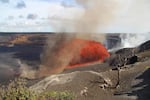 In this image released by the U.S. Geological Survey, the Kilauea volcano spews lava on Friday, Aug. 22, 2025, in Hawaii Volcanoes National Park, Hawaii.