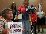 Black Coalition Fighting Back Serial Murders members Suzette Shaw, left, holding photos of 10 victims, and Margaret Prescod, at podium, join relatives of victims speaking after the sentencing for Lonnie Franklin Jr., a convicted serial killer known as the "Grim Sleeper," in Los Angeles Superior Court in August 2016.