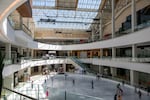 FILE - People ice skate in Lloyd Center in Portland, Ore., Aug. 19, 2025. 