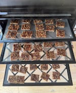 Trays of square snack bars made of dates