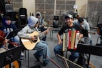 Students share a laugh in Cindy Flores’ mariachi class at McKay High School in Salem, Ore., on March 10, 2026.