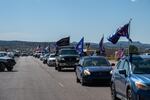 The McKinley County GOP drove about a dozen cars waving GOP flags for Trump and New Mexican Republican candidates by honking their horns.