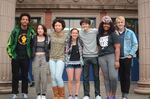 Dylan Palmer, Eileen Conley, Brianna Henderson, Alejandra Alvarado, Mackie Mallison, Sade Means and Finn Hawley-Blue pose in front of Grant High.