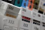 Juul products are displayed at a smoke shop in New York, on Dec. 20, 2018. E-cigarette giant Juul Labs will pay Washington state $22.5 million and has agreed to a variety of reforms to prevent underage use and sales under a settlement announced on Wednesday by state Attorney General Bob Ferguson.