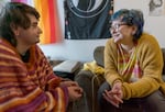 Marcieline Novatore, left, and her partner Eloise Zana, in their Northwest Portland home, Jan. 22, 2024. “When I met Marcie I was not yet homeless,” said Zana, who started dating Novatore in winter 2021 while attending Portland State University. “She was in the homeless youth continuum and I had no idea that it existed, like, four blocks from me.”  