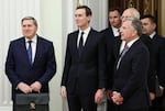 FILE - Russian Presidential foreign policy adviser Yuri Ushakov, left, U.S. President Donald Trump's son-in-law Jared Kushner, center, U.S. special envoy Steve Witkoff, foreground right, and Russian Direct Investment Fund CEO Special Presidential Representative for Investment and Economic Cooperation with Foreign Countries Kirill Dmitriev, behind Witkoff, arrive to attend talks with Russian President Vladimir Putin at the Senate Palace of the Kremlin in Moscow, Russia, Dec. 2, 2025.