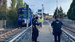 Portland police respond to reports of a stabbing on a TriMet MAX Light Rail train Saturday, Sept. 2, 2023, in Southeast Portland, Ore.