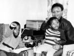 The children of slain South African Black Consciousness leader Steve Biko give a Black Power salute as they sit at home with their aunt, Biko's sister, Nobandile Mvovo, Sept. 15, 1977, in their home at King Williams Town.