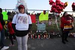 Family and community members gather to remember Carlos Hunter at a candlelight vigil in Hazel Dell, Washington.