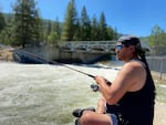 Jason Wahlawitsa fishes for salmon at Icicle creek at the Leavenworth Fish Hatchery, June 4, 2021.